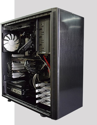 A black computer case with a fan attached to it.